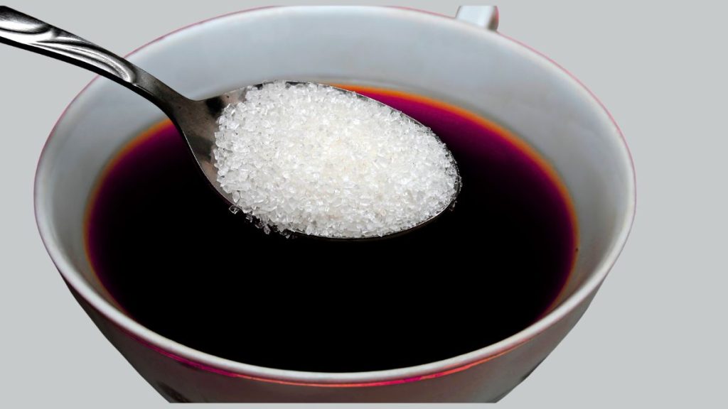 adding sugar after chai
